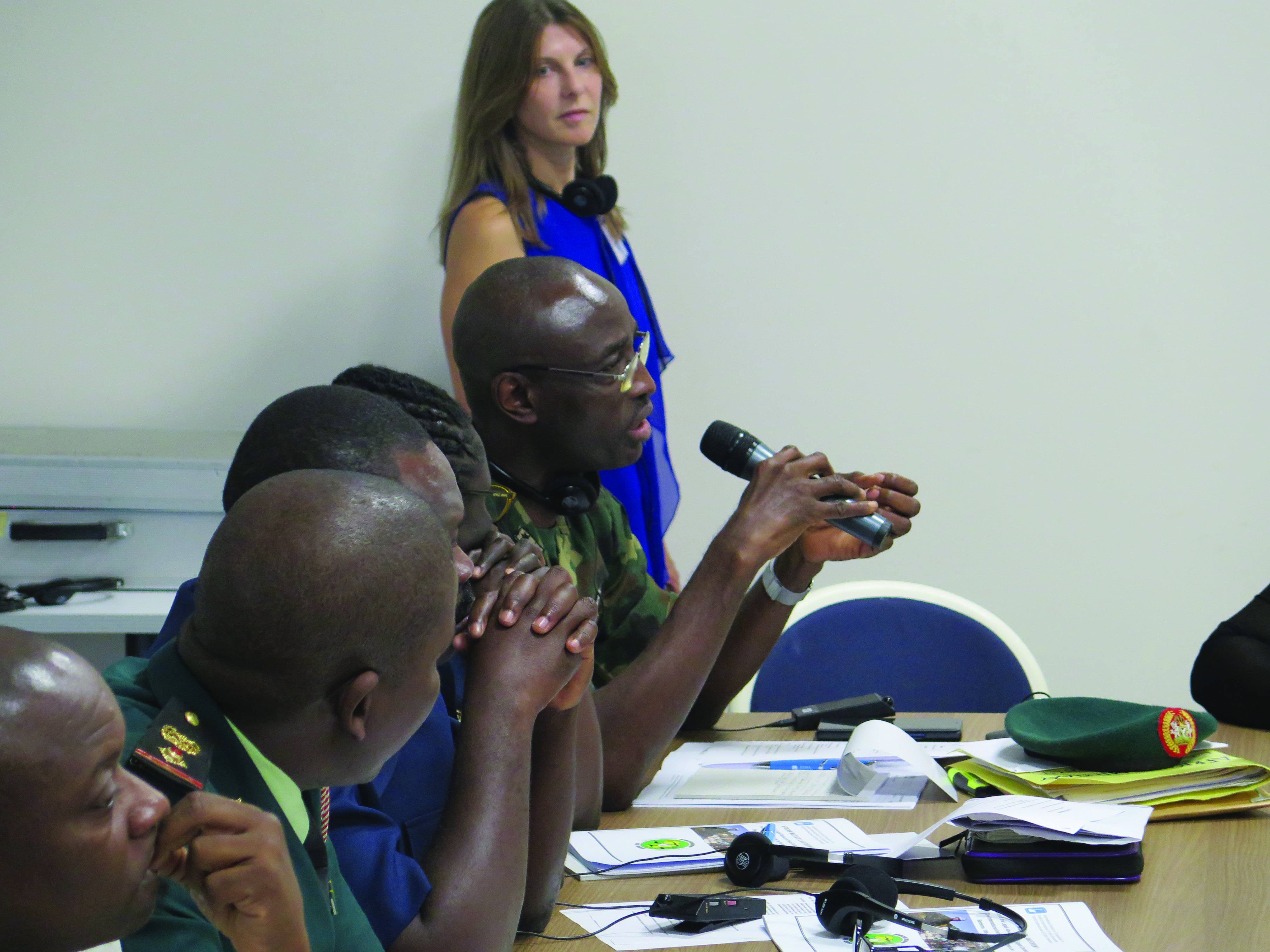 Brigadier General Yosef Shalangwe, TJAG,
        Nigerian Armed Forces, addresses the fifth Africa
        Military Law Forum with Ms. Sandra Franzblau
        facilitating, at the International Institute for
        Humanitarian Law, Sanremo, Italy, 12 September
        2019. (Photo courtesy of Sandra Franzblau)